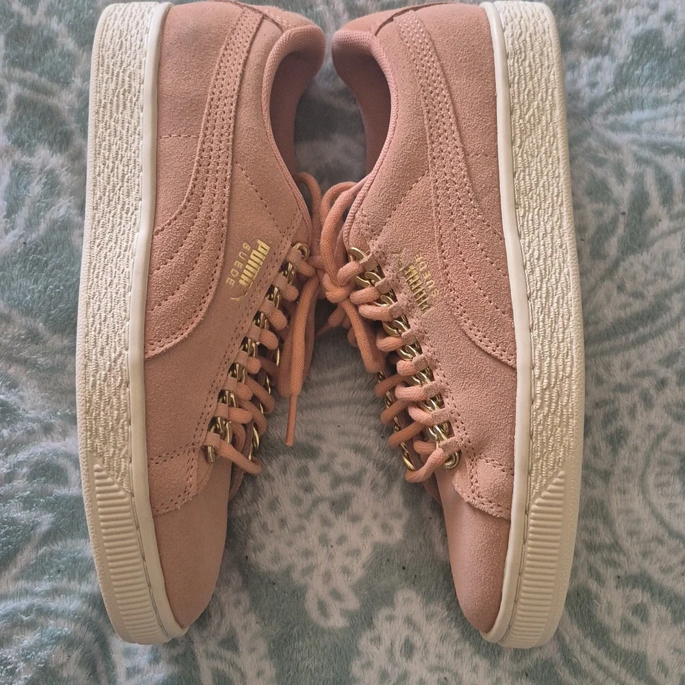 Puma Pink Suede Low-Top Sneakers with Gold Accents